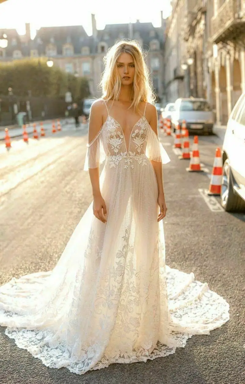 Boho Beach A Line Wedding Dresses Sexy Spaghetti Lace Appliques Bohemian Bridal Gowns Short Sleeve Backless Wedding Dress
Boho Beach A Line Wedding Dresses Sexy Spaghetti Lace Appliques Bohemian Bridal Gowns Short Sleeve Backless Wedding Dress