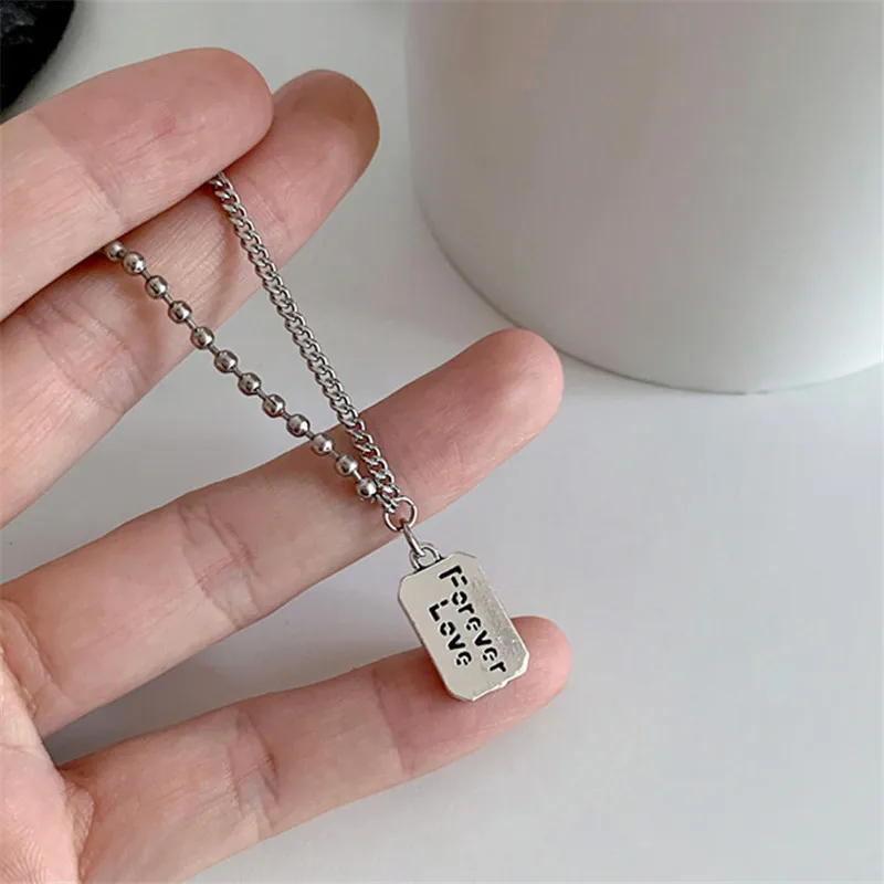 XIYANIKE 925 Sterling Silver Two-sided Letter Black Rhinestone Pendant Necklace Women Fashion Rectangle Clavicle Chain Jewelry
XIYANIKE 925 Sterling Silver Two-sided Letter Black Rhinestone Pendant Necklace Women Fashion Rectangle Clavicle Chain Jewelry