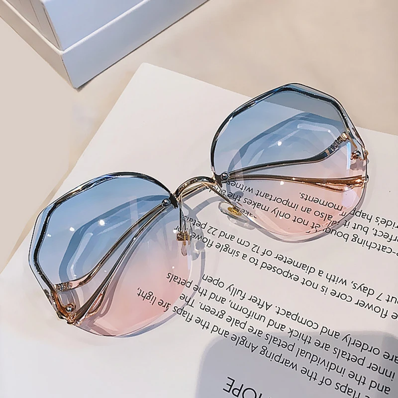 The New Korean Version Of The Trendy Gradient Color Sunglasses Fashion Female Net Red Curved Legs Frameless Trim Metal Glasses
The New Korean Version Of The Trendy Gradient Color Sunglasses Fashion Female Net Red Curved Legs Frameless Trim Metal Glasses