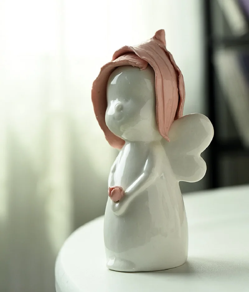 3PCS Little girl children's room simple crafts white silly cute little angel white ceramic red hat doll doll 
3PCS Little girl children's room simple crafts white silly cute little angel white ceramic red hat doll doll