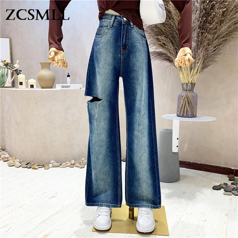 ZCSMLL Ripped Jeans Women Summer 2021 New Korean Style Straight Loose High Waist Wide Leg Women Fashion Denim Pants Trend
ZCSMLL Ripped Jeans Women Summer 2021 New Korean Style Straight Loose High Waist Wide Leg Women Fashion Denim Pants Trend