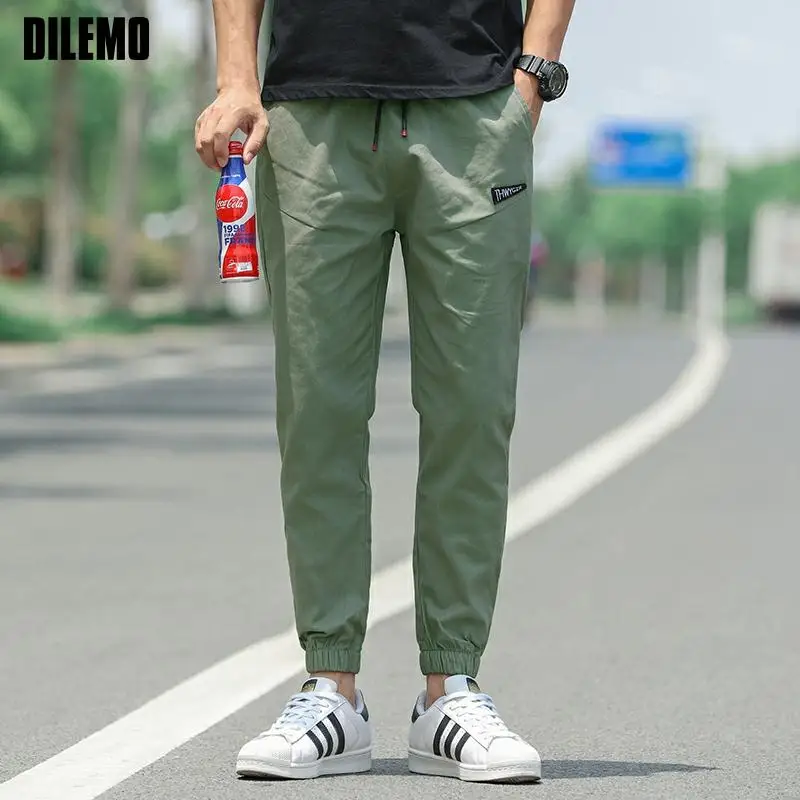 Top Quality New Designer Brand Casual Fashion Strappy Pants For Men Cotton Teens Elastic Street Style Trousers Men Clothes
Top Quality New Designer Brand Casual Fashion Strappy Pants For Men Cotton Teens Elastic Street Style Trousers Men Clothes