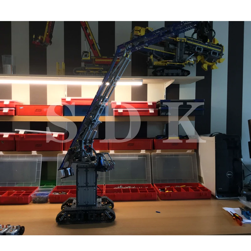MOC Remote Control Version of Railway Station Wharf Crawler Crane Grabs Cargo and Heavy Machinery Compatible with LE Bricks
MOC Remote Control Version of Railway Station Wharf Crawler Crane Grabs Cargo and Heavy Machinery Compatible with LE Bricks