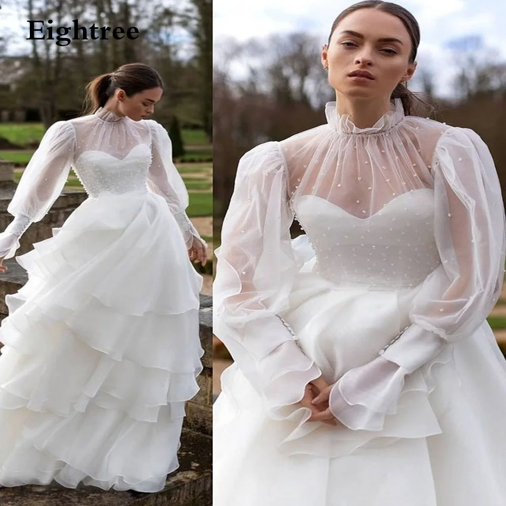 Eightree High Neck Tulle With Pearl Prom Dresses Long Sleeve Lace Tiered Formal Gown Floor Length Illusion Evening Dress 
Eightree High Neck Tulle With Pearl Prom Dresses Long Sleeve Lace Tiered Formal Gown Floor Length Illusion Evening Dress