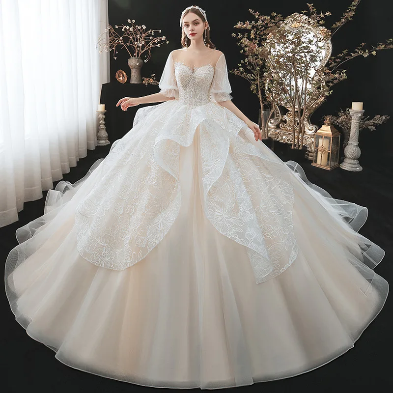 Luxury Wedding Dress 2022 New A-Line Elegant Lace Puff Sleeves O-Neck Chapel Train Shining Beading Appliques Princess Bride Gown
Luxury Wedding Dress 2022 New A-Line Elegant Lace Puff Sleeves O-Neck Chapel Train Shining Beading Appliques Princess Bride Gown
