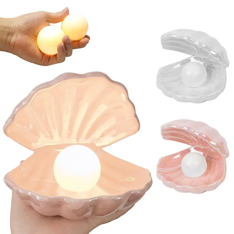Creative Ceramic Shell Pearl Night Light Streamer Fairy Shell Night Light For Bedside Home Decoration Mermaid Gifts
Creative Ceramic Shell Pearl Night Light Streamer Fairy Shell Night Light For Bedside Home Decoration Mermaid Gifts