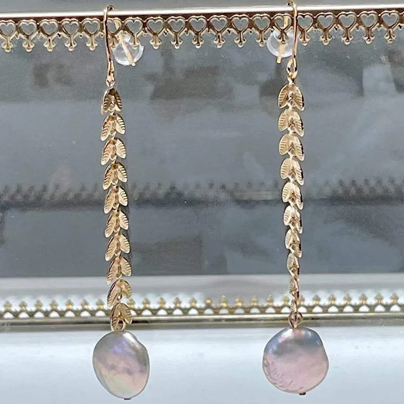 Long button Baroque Pearl Earrings ins cool style retro exaggerated Earrings round face thin ear of wheat Earrings
Long button Baroque Pearl Earrings ins cool style retro exaggerated Earrings round face thin ear of wheat Earrings
