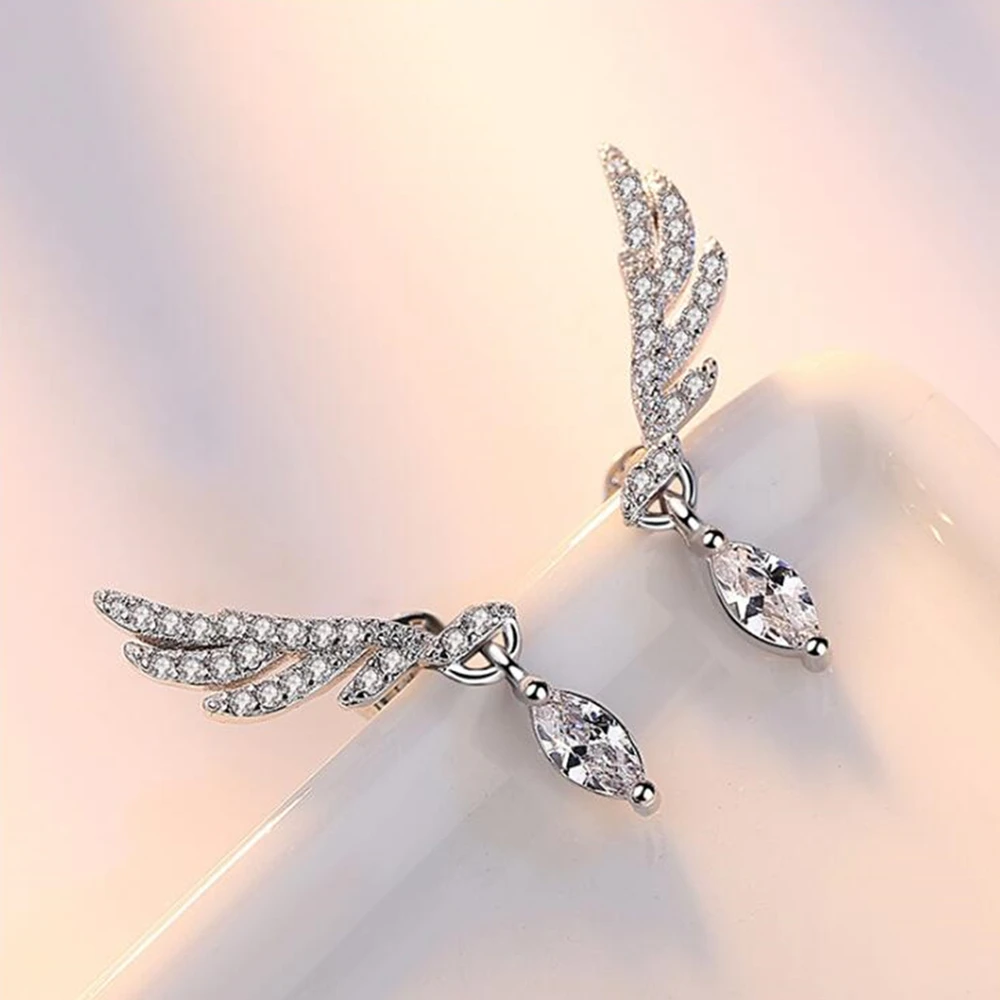 925 Sterling Silver New Woman Luxury Fashion Brand Temperament Zircon Geometry Wings Female Small Jewelry Lovely Simple Earrings
925 Sterling Silver New Woman Luxury Fashion Brand Temperament Zircon Geometry Wings Female Small Jewelry Lovely Simple Earrings