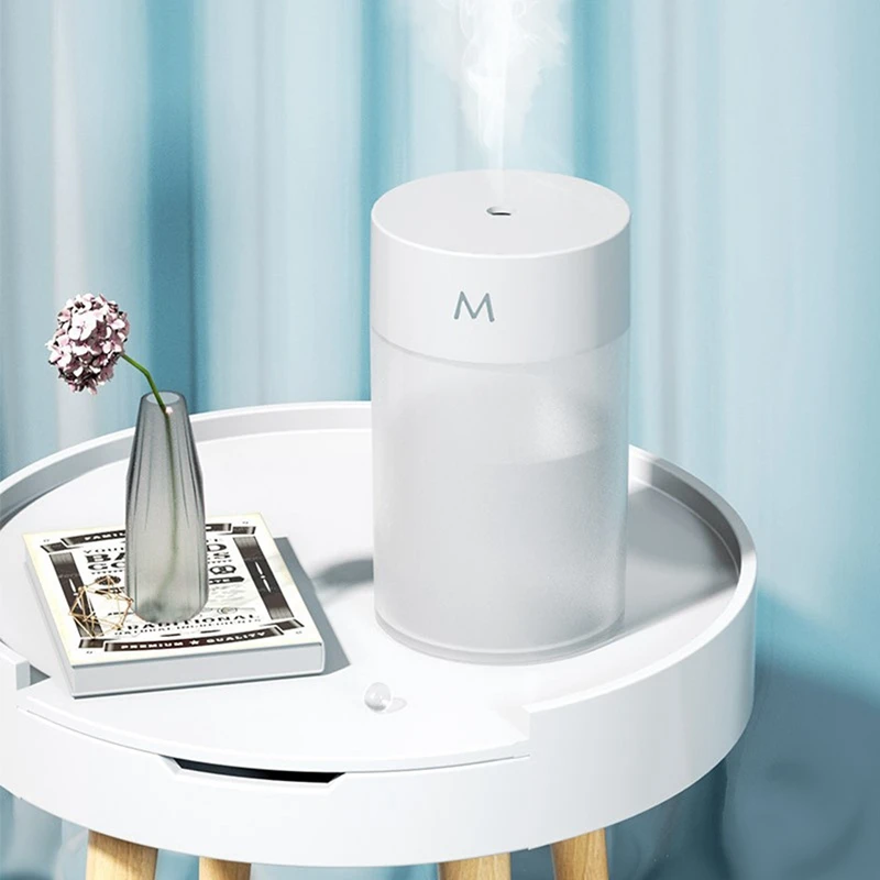 Mini Air Humidifier Portable USB Aroma Diffuser Desktop Air Diffuser with Colored Night Light for Home Car Office 
Mini Air Humidifier Portable USB Aroma Diffuser Desktop Air Diffuser with Colored Night Light for Home Car Office