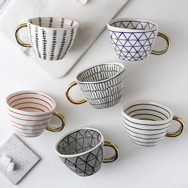 Gold Handle Ceramic Mug Hand Painted Geometric Coffee Milk Tea Cups Creative Personalized Irregular Gift Mark Cup
Gold Handle Ceramic Mug Hand Painted Geometric Coffee Milk Tea Cups Creative Personalized Irregular Gift Mark Cup