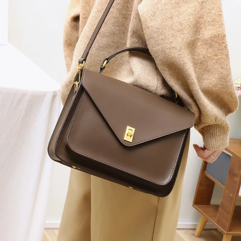 Women's Bag New 2021 Fashion Vintage Cow Split Leather Handbag Postman's Messenger Bag Single Shoulder Bag
Women's Bag New 2021 Fashion Vintage Cow Split Leather Handbag Postman's Messenger Bag Single Shoulder Bag