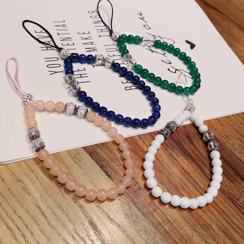 Mobile phone lanyard short wrist strap crystal beads hand-woven rope strong and durable mobile phone case universal lanyard
Mobile phone lanyard short wrist strap crystal beads hand-woven rope strong and durable mobile phone case universal lanyard