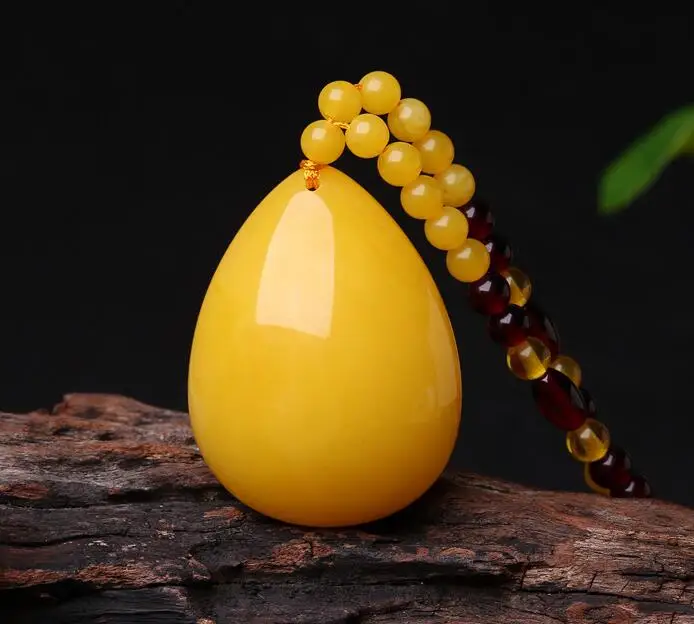 Beeswax Nothing Brand Pendant Chicken Oil Yellow Old Honey Drop Shaped Necklace Men's and Women's Amber Sweater Chain Pendant
Beeswax Nothing Brand Pendant Chicken Oil Yellow Old Honey Drop Shaped Necklace Men's and Women's Amber Sweater Chain Pendant