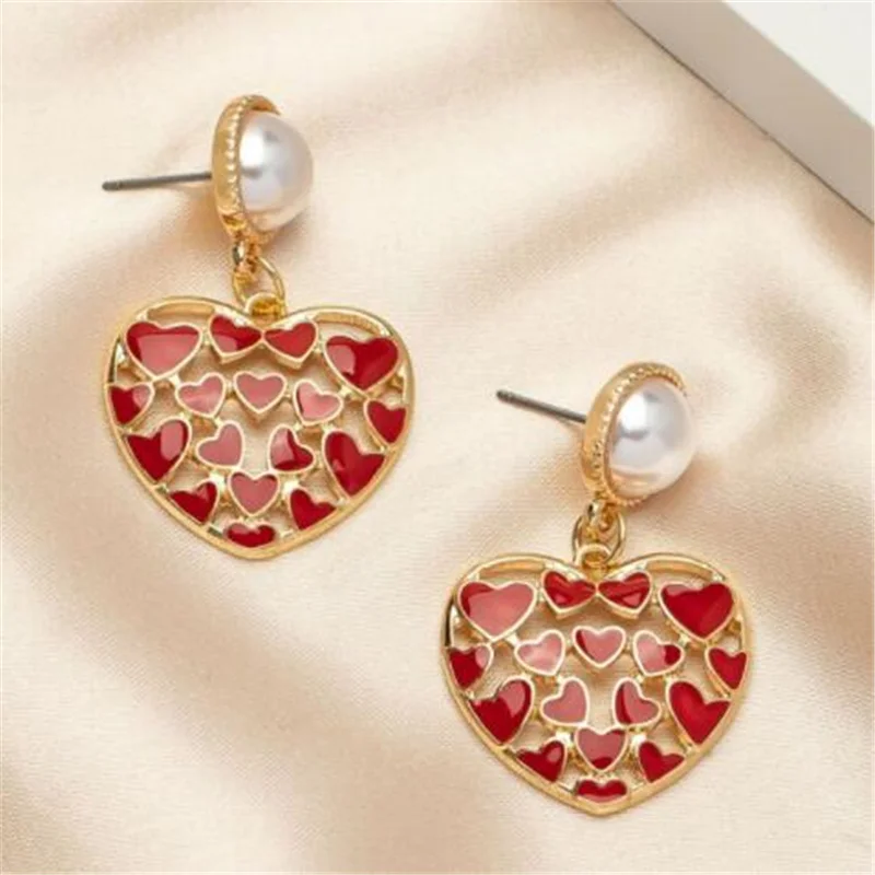 Fashion Simple Red Heart-Shaped Pearl Earrings Drop Earrings for Women Romantic Wedding Female Jewelry
Fashion Simple Red Heart-Shaped Pearl Earrings Drop Earrings for Women Romantic Wedding Female Jewelry