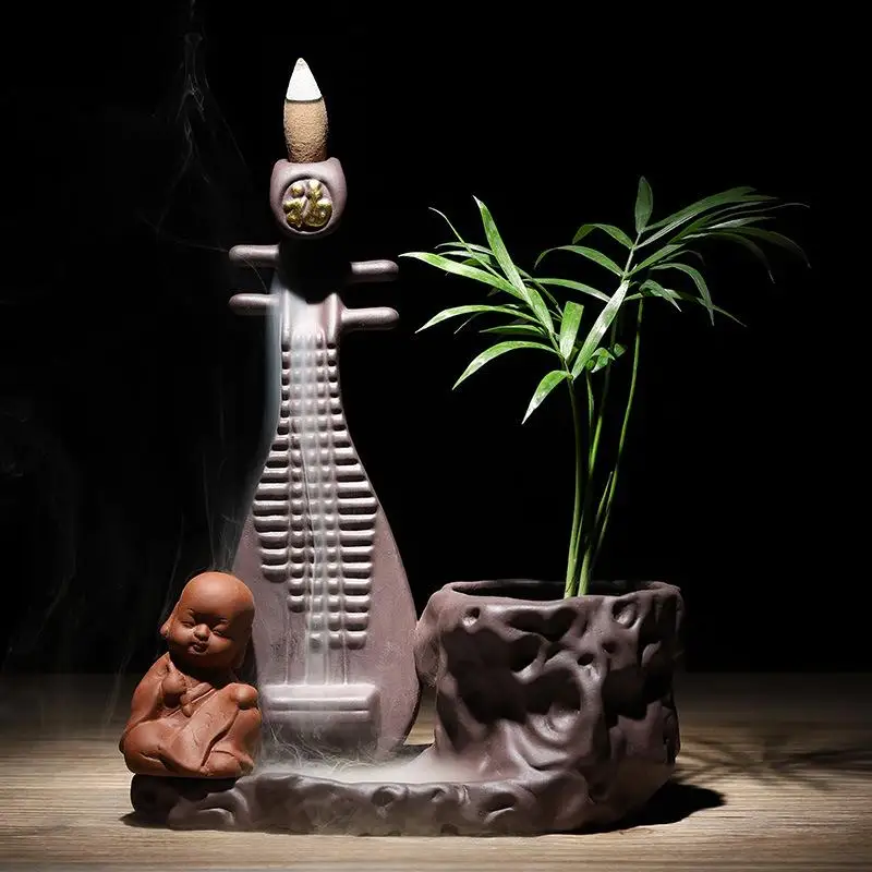 New Purple Clay Zen Little Monk Pipa Creative Backflow Incense Burner Ornaments Can Plant Trees Home Landscape Furnishings
New Purple Clay Zen Little Monk Pipa Creative Backflow Incense Burner Ornaments Can Plant Trees Home Landscape Furnishings