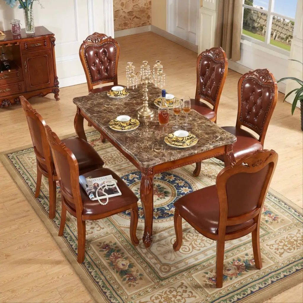 Table chair combination solid wood marble dining table household simple European rectangular table
Table chair combination solid wood marble dining table household simple European rectangular table