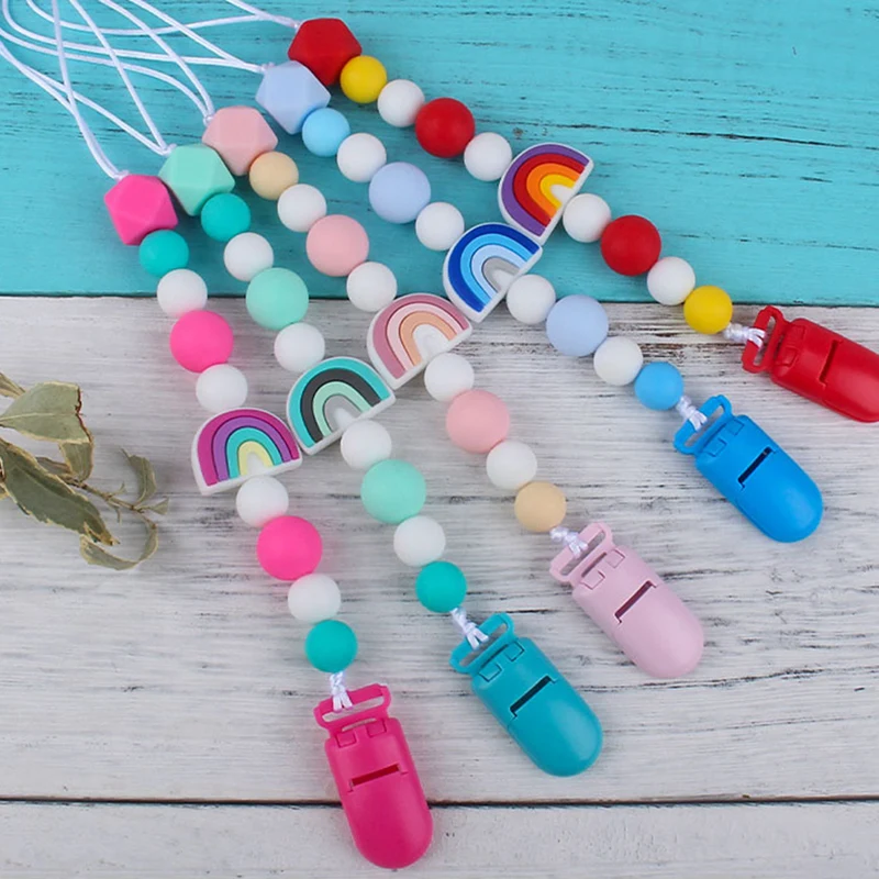 Baby Pacifier Clips Nipple Chain Rainbow Silicone Teether Beads Infant Dummy Pacifier Baby Teether Rodent Toddler Products
Baby Pacifier Clips Nipple Chain Rainbow Silicone Teether Beads Infant Dummy Pacifier Baby Teether Rodent Toddler Products
