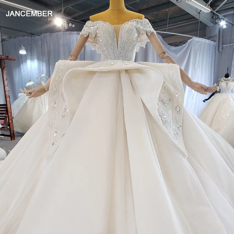 HTL2210 Boat Neck luxury wedding dress 2021glitters wedding dress off shoulder plus size civil robe de mariee grande taille
HTL2210 Boat Neck luxury wedding dress 2021glitters wedding dress off shoulder plus size civil robe de mariee grande taille