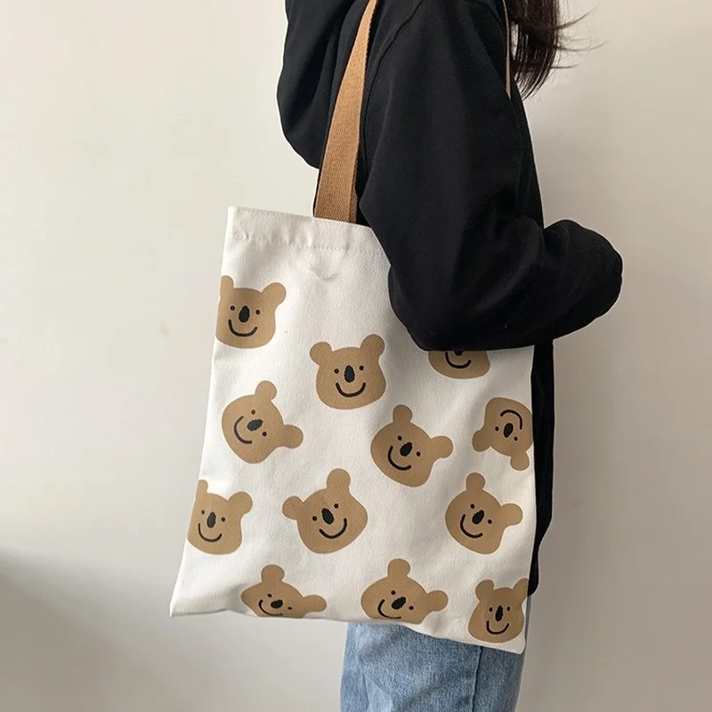 New Canvas Shoulder Shopper Bag for Women 2021 Girl Cartoon Bear White Female Handbags Cloth Shopping Bags Ladies Tote Beach Bag
New Canvas Shoulder Shopper Bag for Women 2021 Girl Cartoon Bear White Female Handbags Cloth Shopping Bags Ladies Tote Beach Bag