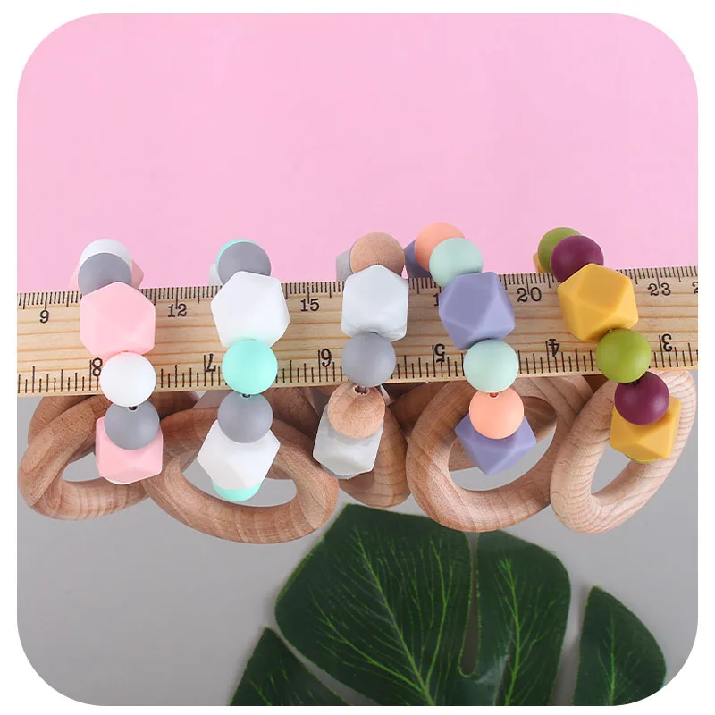XCQGH 1Pcs Baby Teether Bracelet Beech Wooden Rattle Ring Teething Nursing Bracelets BPA Free Silicone Bead Wooden Rodent
XCQGH 1Pcs Baby Teether Bracelet Beech Wooden Rattle Ring Teething Nursing Bracelets BPA Free Silicone Bead Wooden Rodent