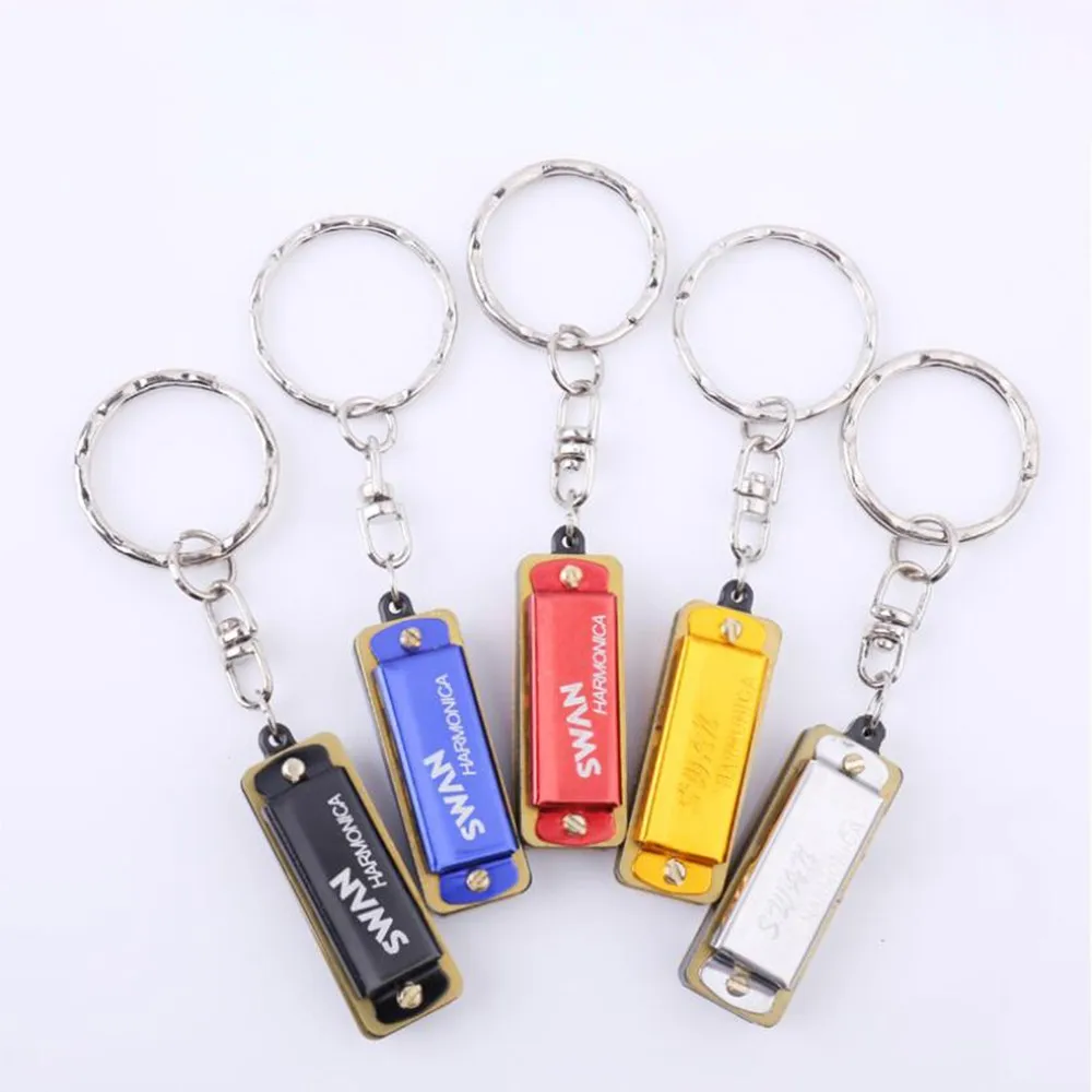 Mini Harmonica Keychain Key 4 Holes 8 Tone Small Woodwind Instruments Design Accessory Mini Musical Instrument Gift Keychain
Mini Harmonica Keychain Key 4 Holes 8 Tone Small Woodwind Instruments Design Accessory Mini Musical Instrument Gift Keychain
