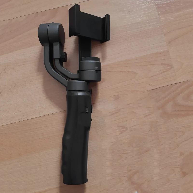 Three-Axis Handheld Stabilizer Mobile Phone Intelligent Anti-Shake Pan/Tilt Mobile Phone Live Broadcast Utensil
Three-Axis Handheld Stabilizer Mobile Phone Intelligent Anti-Shake Pan/Tilt Mobile Phone Live Broadcast Utensil
