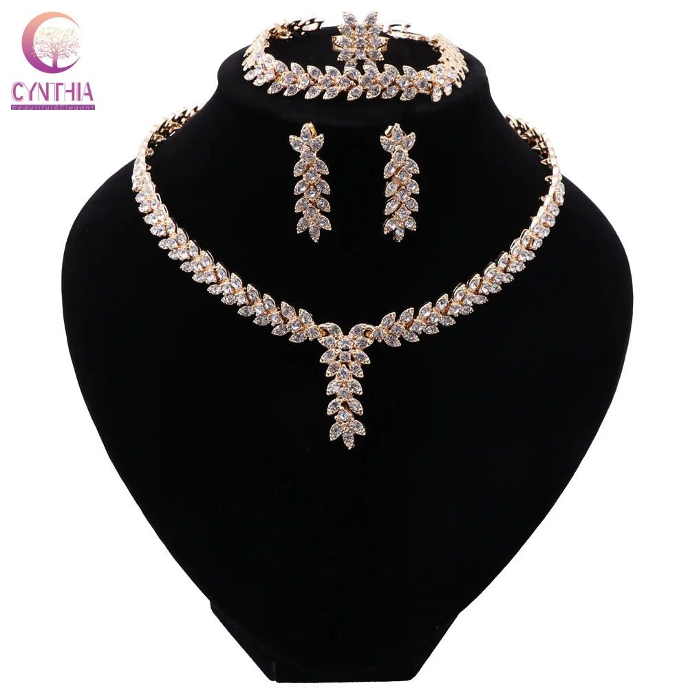 CYNTHIA Nigeria Leaves Shaped Necklace Crystal Earrings Charm Bride Earrings Ring for Women Party Gift Fashion Jewelry Sets
CYNTHIA Nigeria Leaves Shaped Necklace Crystal Earrings Charm Bride Earrings Ring for Women Party Gift Fashion Jewelry Sets