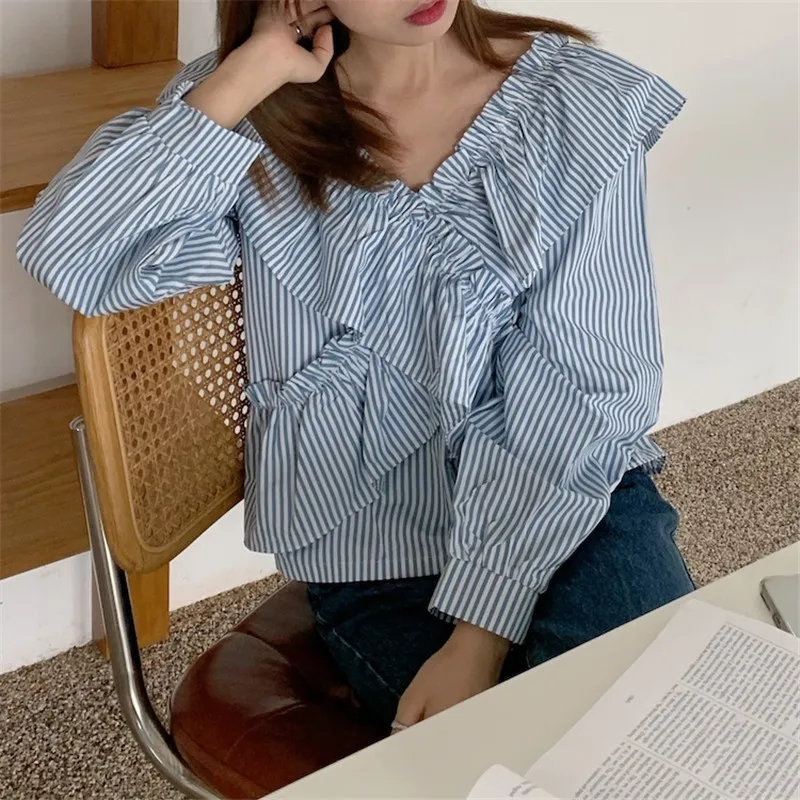 RUGOD 2021 Fashion v-neck striped cross stitching wood ears ruffled long-sleeved shirt top women
RUGOD 2021 Fashion v-neck striped cross stitching wood ears ruffled long-sleeved shirt top women