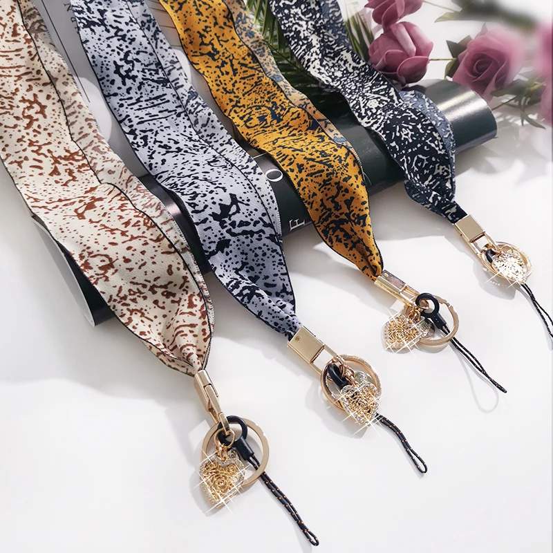 Mobile phone lanyard net yarn silk scarf ink pattern women's long halter neck universal personality fashion anti-lost chain
Mobile phone lanyard net yarn silk scarf ink pattern women's long halter neck universal personality fashion anti-lost chain