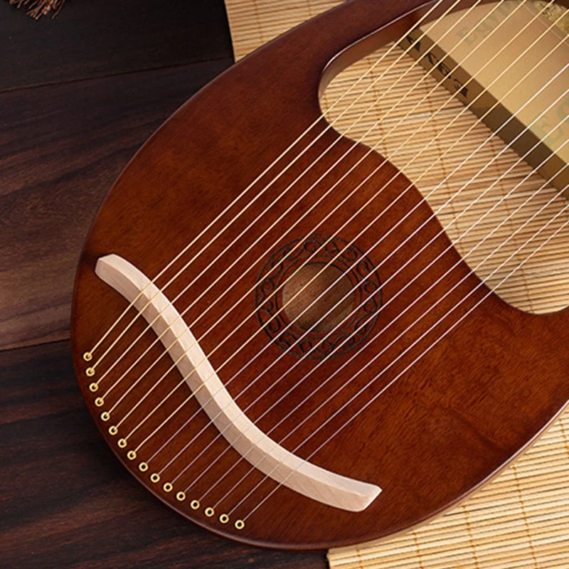 Lyre Harp, 16 String Mahogany Body String Instrument Body Instrument with Tuning Wrench and Spare Strings 
Lyre Harp, 16 String Mahogany Body String Instrument Body Instrument with Tuning Wrench and Spare Strings
