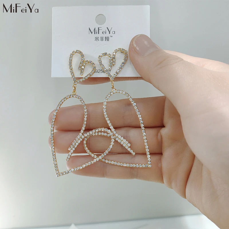 MFY Korean earrings female simple irregular heart-shaped hollow inlaid zircon earrings fashion girl birthday party earrings
MFY Korean earrings female simple irregular heart-shaped hollow inlaid zircon earrings fashion girl birthday party earrings