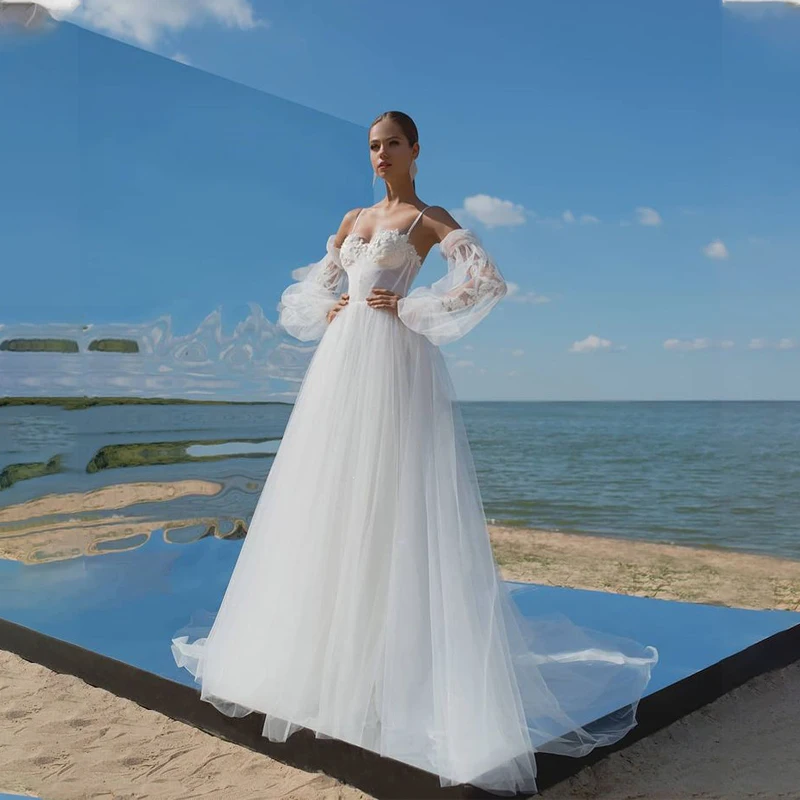Spaghetti Straps Sweetheart A-line Wedding Dress Lace-up Tulle Beach Bridal Dress with Removeable Long Sleeves
Spaghetti Straps Sweetheart A-line Wedding Dress Lace-up Tulle Beach Bridal Dress with Removeable Long Sleeves