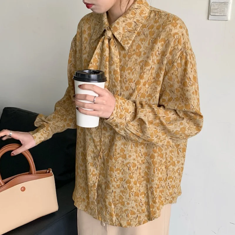 Korean Chic Women's Printing Lapel Tie Bow Loose Irregular Blouse Single Breasted Long Sleeve Shirt Female Tide U161
Korean Chic Women's Printing Lapel Tie Bow Loose Irregular Blouse Single Breasted Long Sleeve Shirt Female Tide U161