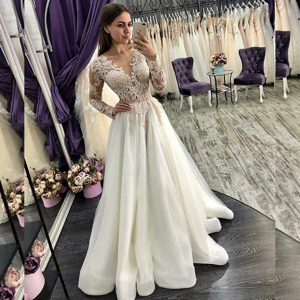Gorgeous A-line Lace Wedding Dress Applique Tulle Sheer Long Sleeves Bridal Dresses Party Formal Gowns Vestidos de Noiva 2020
Gorgeous A-line Lace Wedding Dress Applique Tulle Sheer Long Sleeves Bridal Dresses Party Formal Gowns Vestidos de Noiva 2020