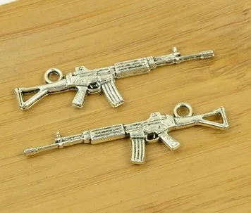 Ручная работа серьги шармы; Аксессуары Diy для изготовления ювелирных изделий браслет с подвеской 10 шт. 43x12 мм старинное серебро Цвет пистолет-пулемет подвески
Ручная работа серьги шармы; Аксессуары Diy для изготовления ювелирных изделий браслет с подвеской 10 шт. 43x12 мм старинное серебро Цвет пистолет-пулемет подвески