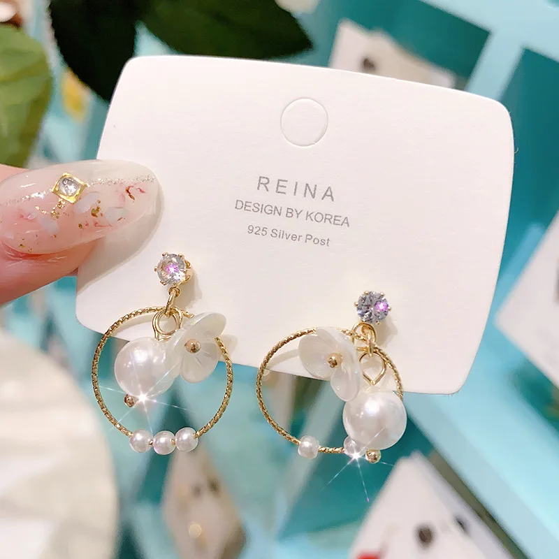 New simple fashion retro small fresh shell flower S925 silver needle earrings for women
New simple fashion retro small fresh shell flower S925 silver needle earrings for women