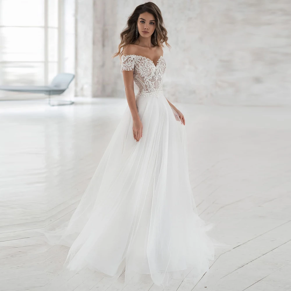 Vestidos Elegant Wedding Dresses Tulle Illusion Appliques Sweetheart Off-Shoulder Covered Button Ball Bridal Gowns
Vestidos Elegant Wedding Dresses Tulle Illusion Appliques Sweetheart Off-Shoulder Covered Button Ball Bridal Gowns