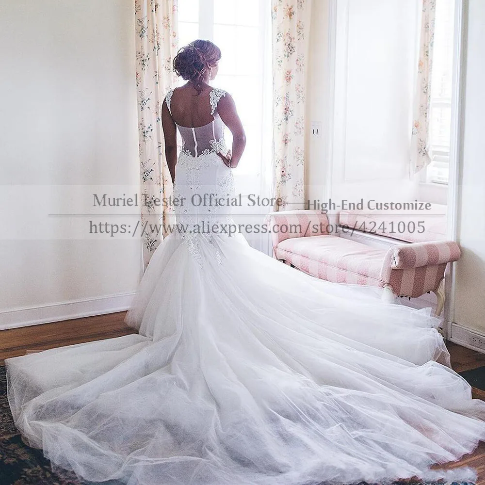 Aso Ebi Dubai African Cap Sleeves V Neck Lace Appliques Beaded Bridal Gown See Through Tulle Back Mermaid Wedding Dress Marriage
Aso Ebi Dubai African Cap Sleeves V Neck Lace Appliques Beaded Bridal Gown See Through Tulle Back Mermaid Wedding Dress Marriage