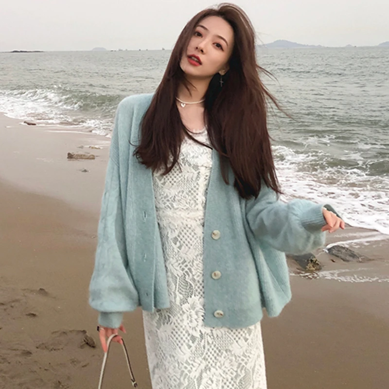 Women Sweater Cardigan 2021 Winter Solid Cashmere Top Casual Cardigans Chic Korean Fashion Winter Knit Jacket sueters mujer
Women Sweater Cardigan 2021 Winter Solid Cashmere Top Casual Cardigans Chic Korean Fashion Winter Knit Jacket sueters mujer