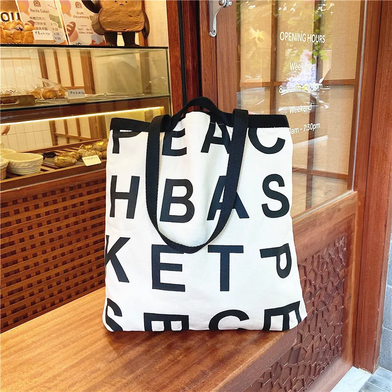 2022 Women Large Letter Shopping Bag Canvas Handbag Tote Messenger Casual Female Shoulder Bag Reusable Tote Bolsa 
2022 Women Large Letter Shopping Bag Canvas Handbag Tote Messenger Casual Female Shoulder Bag Reusable Tote Bolsa