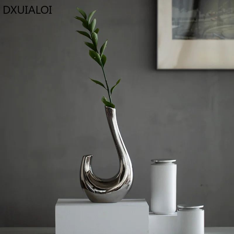 Modern simplicity ceramic vase home decoration accessories creative ceramic crafts gooseneck silver plating vase Flower Vase
Modern simplicity ceramic vase home decoration accessories creative ceramic crafts gooseneck silver plating vase Flower Vase