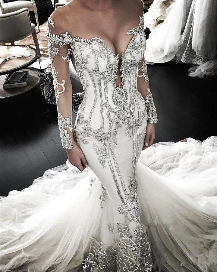 Sheer Mesh Top Lace Mermaid Wedding Dresses 2019 Tulle Lace Applique Beaded Crystals Long Sleeves Wedding Bridal Gowns
Sheer Mesh Top Lace Mermaid Wedding Dresses 2019 Tulle Lace Applique Beaded Crystals Long Sleeves Wedding Bridal Gowns