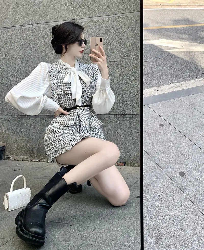 New Autumn Plaid Two-Piece Sleeveless Vest Jacket Female Button Loose Wool Fringed Belt top + Chiffon Bow Two-Piece Shirt
New Autumn Plaid Two-Piece Sleeveless Vest Jacket Female Button Loose Wool Fringed Belt top + Chiffon Bow Two-Piece Shirt
