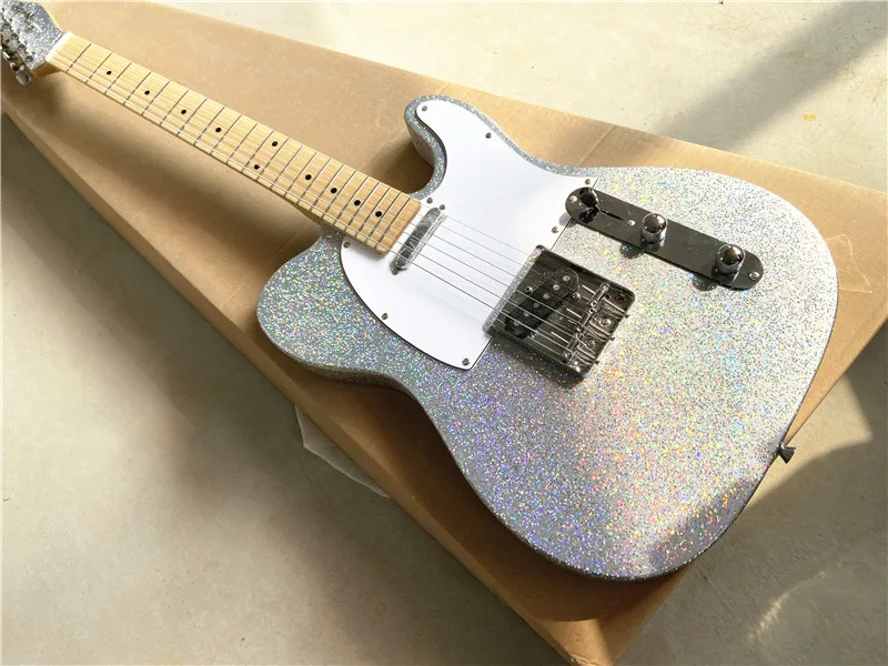 Customized color large grain metal flash silver electric guitar maple xylophone neck can be customized free shipping
Customized color large grain metal flash silver electric guitar maple xylophone neck can be customized free shipping