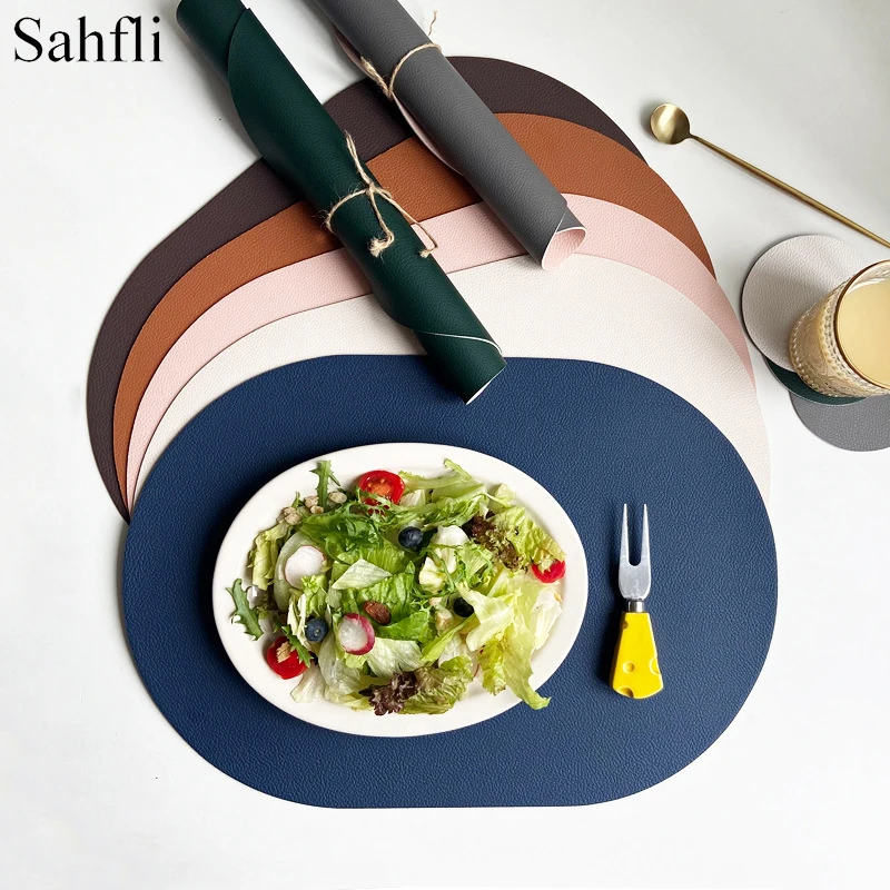 Nordic Ellipse Table Placemats PU Tableware Pad Coaster Faux Leather Kitchen Table Mats Heat Insulation Fashion Tabletop Decor
Nordic Ellipse Table Placemats PU Tableware Pad Coaster Faux Leather Kitchen Table Mats Heat Insulation Fashion Tabletop Decor