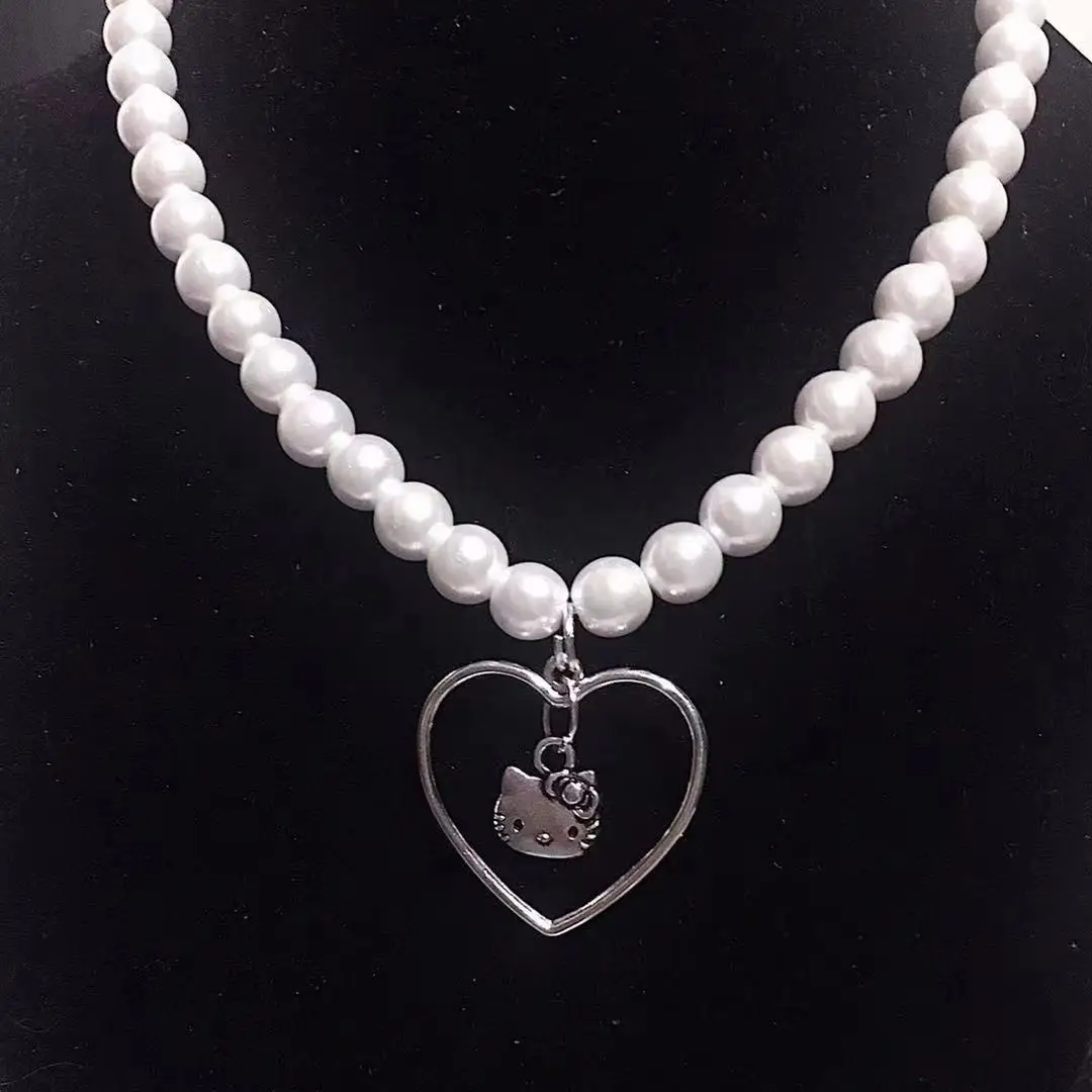 Cartoon cat heart pearl necklace for teenage girls hello ki y2k necklace cute sanrio accessories 2000s aesthetic jewelry kawaii
Cartoon cat heart pearl necklace for teenage girls hello ki y2k necklace cute sanrio accessories 2000s aesthetic jewelry kawaii