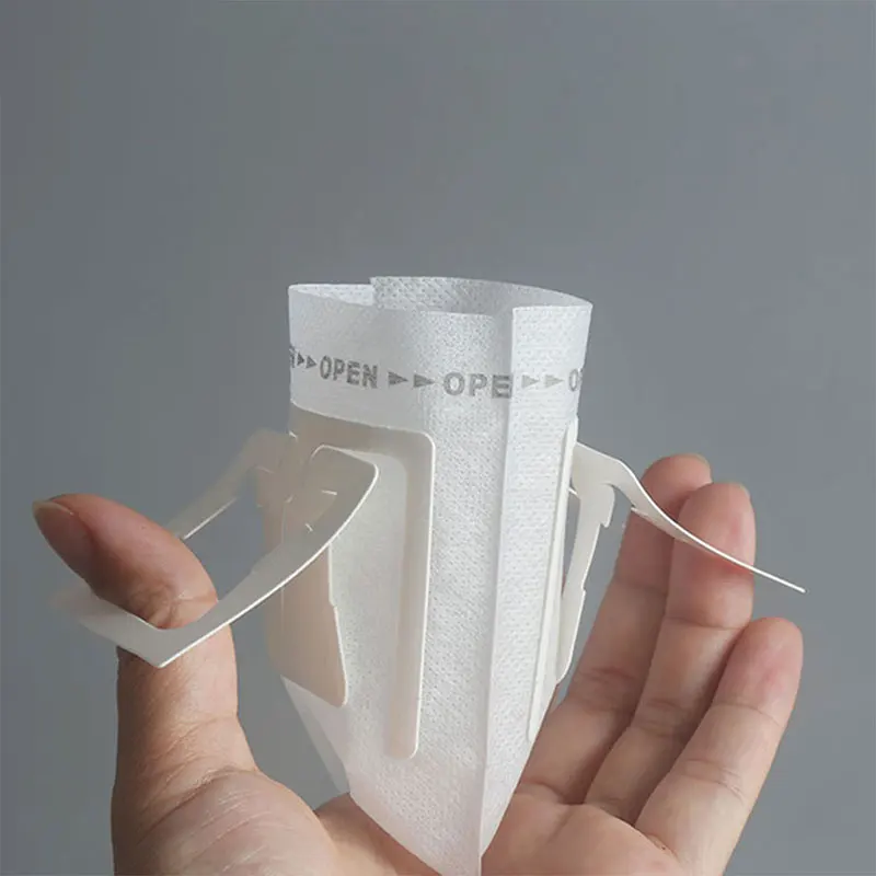 50Pcs / Pack Drip Coffee Filter Bag Portable Hanging Ear Style Coffee Filters Paper Home Office Travel Brew Coffee and Tea Tools
50Pcs / Pack Drip Coffee Filter Bag Portable Hanging Ear Style Coffee Filters Paper Home Office Travel Brew Coffee and Tea Tools