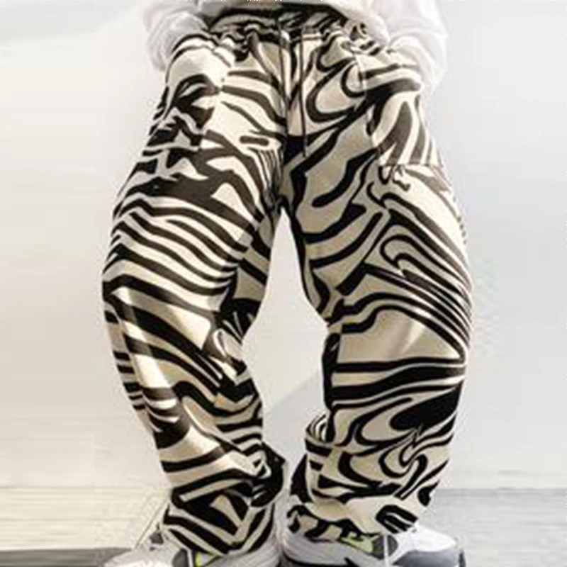 2021 Mens Hipster Loose Straight Pants New Fashion Zebra Printed Wide Leg Pants Autumn Casual Drawstring Trousers Men Streetwear
2021 Mens Hipster Loose Straight Pants New Fashion Zebra Printed Wide Leg Pants Autumn Casual Drawstring Trousers Men Streetwear