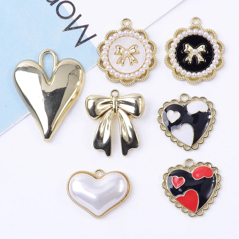5 PCS Alloy Bow Heart Creative Rhinestone Gold Pearls Pendant Button Ornaments Earrings Choker Hair Bag DIY Jewelry Accessories
5 PCS Alloy Bow Heart Creative Rhinestone Gold Pearls Pendant Button Ornaments Earrings Choker Hair Bag DIY Jewelry Accessories
