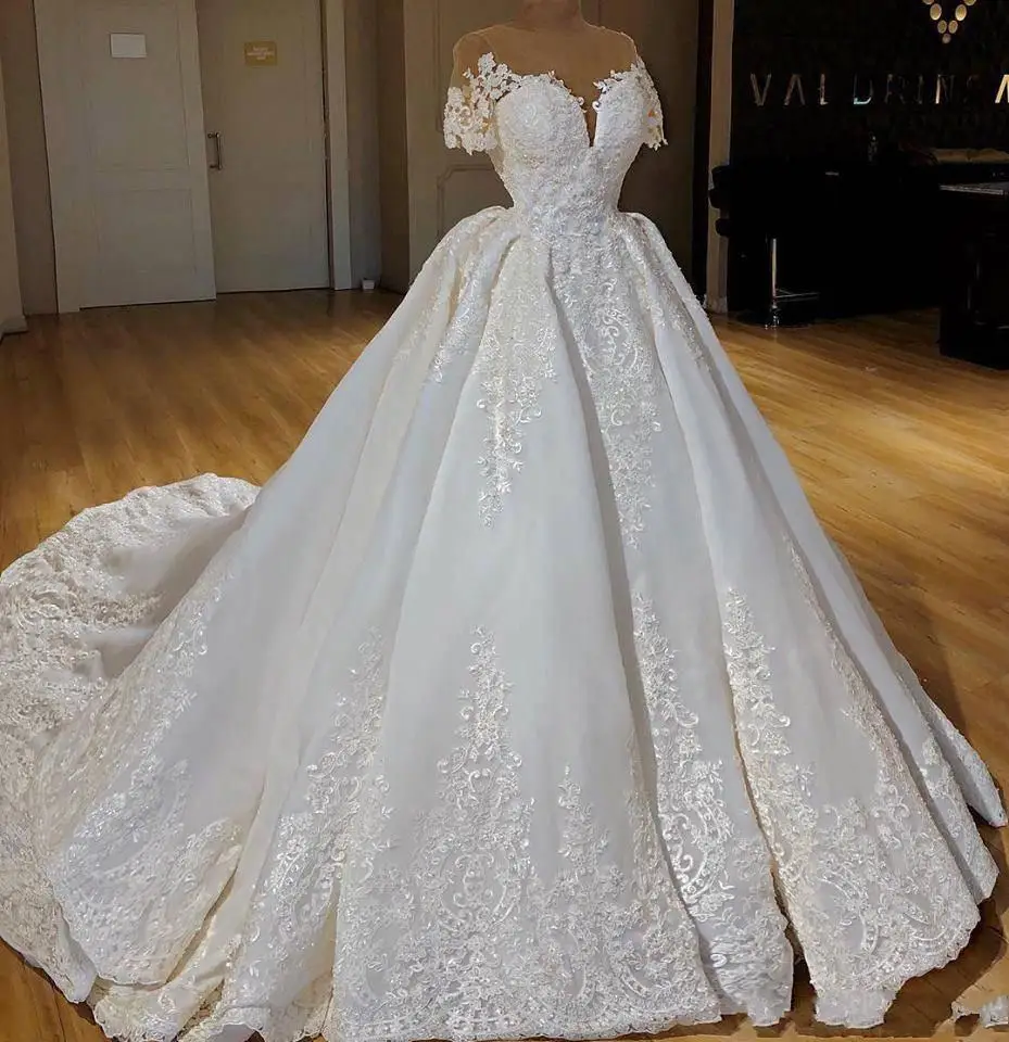 Arabic Dubai Satin Ball Gown Wedding Dresses Embroidery Lace Sheer Crew Neck Beads Short Sleeves Bridal Gown Chapel Train
Arabic Dubai Satin Ball Gown Wedding Dresses Embroidery Lace Sheer Crew Neck Beads Short Sleeves Bridal Gown Chapel Train
